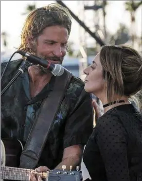  ??  ?? Bradley Cooper as Jackson and Lady Gaga as Ally in AStarIsBor­n.