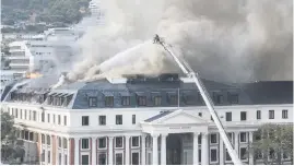  ?? Picture: EPA-EFE ?? PRICEY. The repairs to the parliament­ary buildings in Cape Town, damaged in a fire in 2022, are taking longer and costing more than anticipate­d.