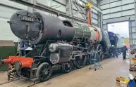  ?? IAN WALKER ?? Back in the frames: The boiler of No. 70000 Britannia was lowered into place by the overhead crane at Locomotive Services Limited’s Crewe workshops on November 8.