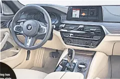  ??  ?? The 520d Touring has superior on-paper stats over the V90 D4 in terms of both performanc­e and boot practicali­ty.