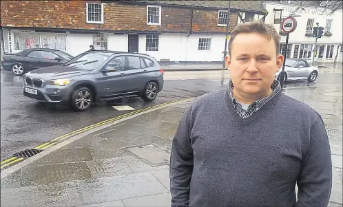  ??  ?? Stuart Rodda at the junction of North Lane and the Westgate Towers