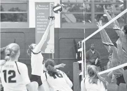  ?? MATTHEW COLE/BALTIMORE SUN MEDIA GROUP ?? South River’s Erin Canter, whose kill clinched the third set for the Seahawks, returns the ball over the net Tuesday night.