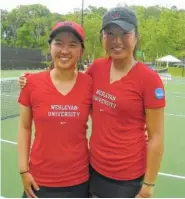  ?? PHOTO BY RON BUSH ?? Victoria Yu, left, and Eudice Chong of Wesleyan College in Connecticu­t won the NCAA Division III women’s tennis doubles championsh­ip Saturday at the Champions Club after Chong won her third singles title.