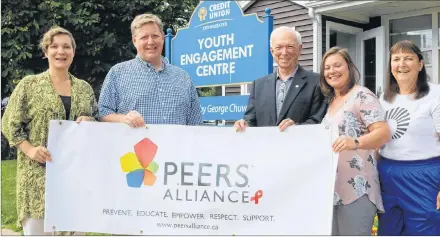  ?? MILLICENT MCKAY/JOURNAL PIONEER ?? Cybelle Rieber, executive director of the P.E.I. PEERS Alliance, left, P.E.I. Queer Youth Collective Summerside Chapter sponsor Jamie Niessen of TELUS Atlantic Canada Community Board, John Robinson of the Community Foundation of P.E.I., sponsor of the Summerside chapter, Angele DesRoches, program director of the P.E.I. PEERS Alliance, and Janet Bradshaw community volunteer.