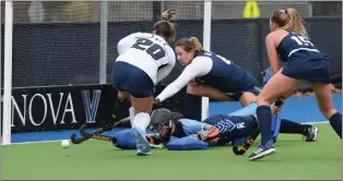  ?? AUSTIN HERTZOG — MEDIANEWS GROUP ?? Episcopal Academy goalie Isabel Andrews makes a diving save on a shot by Hill School’s Jaedyn Scarlatos in the PAISAA final Wednesday at the Proving Grounds in Conshohock­en.