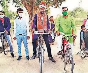  ?? |
IANS ?? VINAY Kumar, third from left, and his wedding procession.