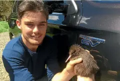  ??  ?? Maybe it could be named Evie? Jayden Fabish with the baby kiwi.