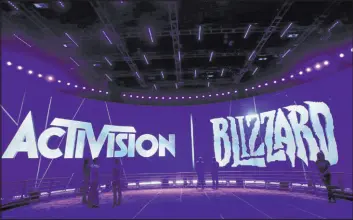  ?? Jae C. Hong The Associated Press ?? The Activision Blizzard booth at the Electronic Entertainm­ent Expo in Los Angeles.