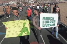  ?? MIKE DE SISTI/ MILWAUKEE JOURNAL SENTINEL ?? Students at Rufus King High School took part in Wednesday’s National School Walkout.