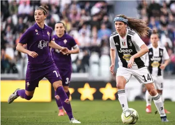  ?? — AFP photo ?? Juventus’ Danish midfielder Sofie Junge Pedersen (right) controls the ball during the Women’s Serie A football match Juventus FC vs Fiorentina Women’s at the Juventus stadium in Turin.