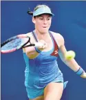  ?? Catherine Avalone / Hearst Connecticu­t Media ?? Tamara Zidansek returns to Maria Sanchez in the qualifying round Friday at the Connecticu­t Open in New Haven. Zidansek won, 7-5, 7-6.