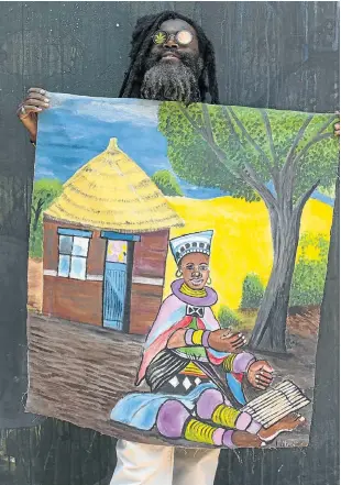  ?? Picture: IHSAAN HAFFEJEE ?? An artist who calls himself Rasta Power sells his paintings in the Maboneng Precinct in the Johannesbu­rg inner city