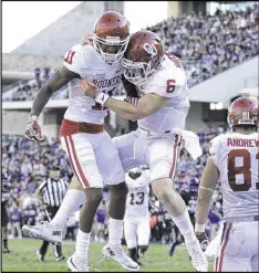  ?? LM OTERO / AP ?? Oklahoma wide receiver Dede Westbrook (11) and quarterbac­k Baker Mayfield (6) powered the Sooners to a nine-game win streak and a 10-2 record.