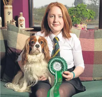  ?? Pictures: Kris Miller / Paul Reid. ?? Left: Erin Logie, 20, with Scout and Paws. Right: Megan Watson, 15, with Charlie.