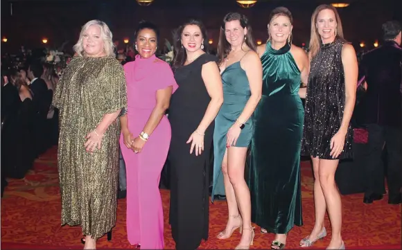  ?? (NWA Democrat-Gazette/Carin Schoppmeye­r) ?? Karen Roberts (from left), Latriece Watkins, Silvia Azrai Kawas, Bethany Stephens, Melody Richard and Laura Phillips gather at the O’ Night Divine Charity Ball to support Mercy Health Foundation Northwest Arkansas on Dec. 3 at the Rogers Convention Center.