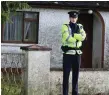  ??  ?? A Garda outside the home of attack victim Joseph Waters