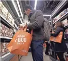  ?? ELAINE THOMPSON/AP ?? Microsoft is trying to duplicate – but not copy – the Amazon Go experience.