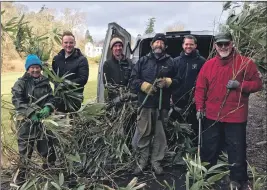  ?? KG_T12_bamboo02 ?? Volunteers helping cut bamboo at Dunollie for pandas and rhinos at Edinburgh Zoo.