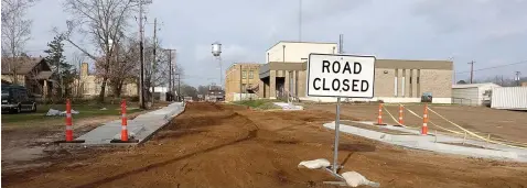  ?? (Photo by Neil Abeles) ?? This is the view looking west along Rush Street toward downtown Linden as it passes the post office on the left and county courthouse on the right in the distance. For weeks this road has been awaiting final approvals and good weather. The road itself is closed, but citizens have accepted this in good spirits over the coming progress.