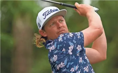  ??  ?? Cameron Smith tees off on the ninth hole during the first round of the RBC Heritage on Thursday. Smith shot a 9-under 62.