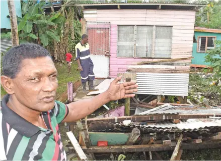  ??  ?? Omkar Road resident, Kishore Sami shows the damage to his house following the flash flooding on October 30, 2017. Photo: Ronald Kumar.