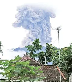  ?? AFP photo ?? This handout photograph shows Mount Agung volcano belching ash in Karangasem Regency, on Indonesia’s resort island of Bali. —