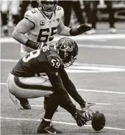  ?? Brett Coomer / Staff photograph­er ?? The Texans recovered their first two fumbles Sunday, including this one by Whitney Mercilus.