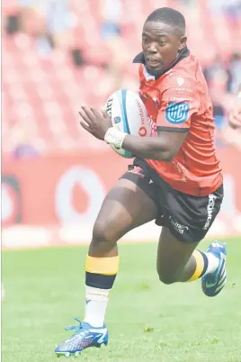  ?? Picture: Gallo Images ?? SLIPPERY CUSTOMER. Lions scrumhalf Sanele Nohamba breaks the Sharks defence on his way to scoring a try during the United Rugby Championsh­ip match at Ellis Park on Saturday.