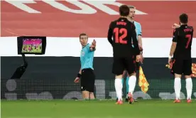  ??  ?? The referee Lawrence Visser consults the monitor before disallowin­g a Manchester United goal against Real Sociedad. Photograph: Jan Kruger/Uefa/Getty Images