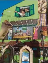  ?? ?? Murals near Arab Street depict Kampong Gelam’s past.