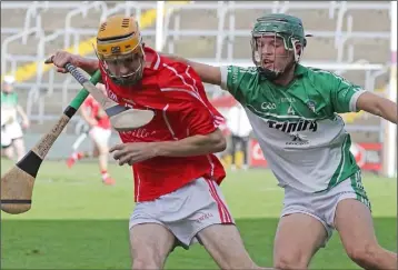  ??  ?? James Dempsey of Cloughbawn applies pressure on Fethard attacker Mark Wallace.