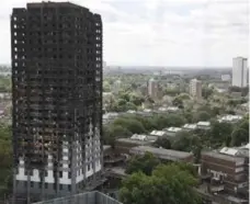  ?? FRANK AUGSTEIN/THE ASSOCIATED PRESS ?? Fire-safety experts say the Grenfell Tower blaze that killed at least 79 people was likely due to a string of failures, not just the cladding.