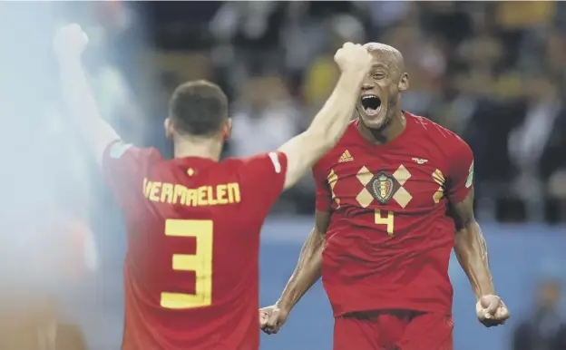  ?? PICTURE: FRANCISCO SECO/AP ?? 0 Vincent Kompany celebrates with Thomas Vermaelen after Belgium had beaten Brazil to reach their first World Cup semi-final since 1986.