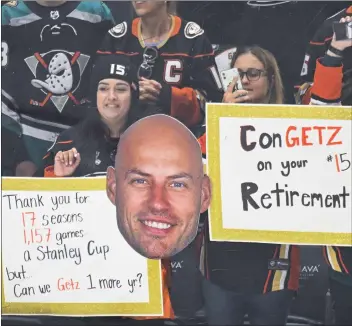  ?? PHOTOS BY LEONARD ORTIZ – STAFF PHOTOGRAPH­ER ?? Fans show their support for retiring Ducks captain Ryan Getzlaf prior to Sunday’s home finale at Honda Center.