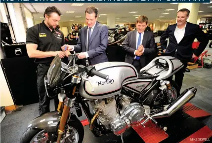  ?? MIKE SEWELL ?? £4m FUNDING PACKAGE BEING QUESTIONED: Ex-Chancellor George Osborne when he visited the Norton motorcycle factory in Castle Donington with Andrew Bridgen MP and chief executive Stuart Garner, far right