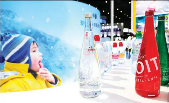  ?? PHOTOS BY WANG QIONG / FOR CHINA DAILY ?? Danone beverage products are displayed during the first China Internatio­nal Import Expo in Shanghai in November 2018.