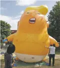  ?? MATT DUNHAM ASSOCIATED PRESS ?? This oversize balloon depicting President Donald Trump as an angry baby in a diaper will be flown from Parliament Square during what are expected to be massive gatherings of protesters opposed to Trump’s presence Friday.