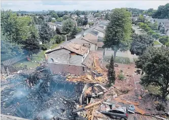  ?? HO THE CANADIAN PRESS ?? Debris is shown following a Wednesday house explosion on Sprucedale Crescent in Kitchener, Ont.