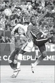  ?? Kevork Djansezian
Getty I mages ?? JOZY ALTIDORE, right, scores on a header in the 89th minute against Canada at the StubHub Center.