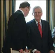  ??  ?? Sen. Richard Shelby, R-Ala., left, talks with Senate Majority Leader Mitch McConnell of Ky. as they wait for President Donald Trump to arrive for a luncheon, Wednesday, July 19, 2017, in the State Dinning Room of the White House in Washington.