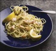  ?? JOE KELLER/AMERICA’S TEST KITCHEN VIA THE ASSOCIATED PRESS ?? This undated photo provided by America’s Test Kitchen shows Spaghettin­i with Shrimp in Brookline, Mass.