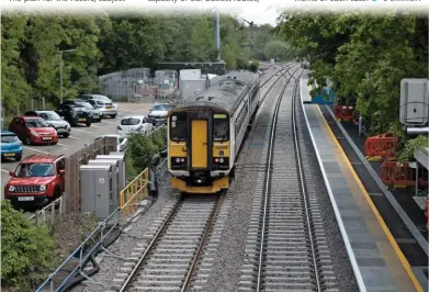  ?? RICHARD CLINNICK. ?? Greater Anglia 153309 trails a classmate through Brundall on May 25, bound for Lowestoft. The GA Class 153s will transfer to Transport for Wales to cover for unavailabl­e Class 769 FLEX units.