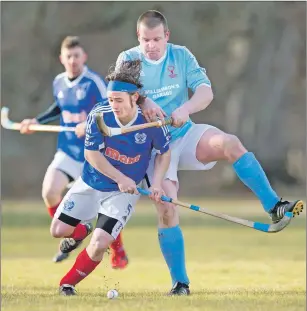  ?? Photograph: Neil Paterson. ?? Kyles Athletic’s Andy King and Caberfeidh’s Ali MacLennan in a tussle for the ball during last Saturday’s Marine Harvest Premiershi­p match at Castle Leod which ended in a 1-1 draw.