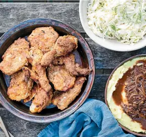  ?? NICOLA GALLOWAY ?? Crispy buttermilk chicken with mashed potatoes and onion gravy makes a healthy and moreish alternativ­e to crispy friend chicken.
