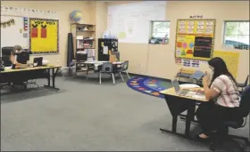  ?? FILE PHOTO ?? A TEACHER AT ED PASTOR ELEMENTARY SCHOOL in San Luis, Ariz., teaches a class online to students during the COVID-19 pandemic. The Gadsden Elementary School District in San Luis and the Somerton Elementary School District have decided to continue distance learning.