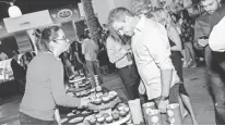  ?? HAUTE EVENT PHOTOGRAPH­Y ?? Cupcakes were just some of the goodies available at last year's NiteFlite Gala.