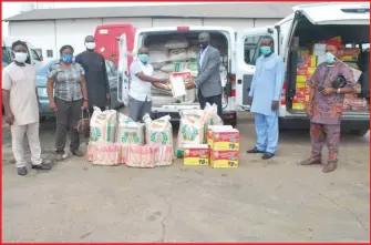  ??  ?? Peter Mgbeahuru, Chairman of the COVID-19 donation committee; Secretary General, Ayokunle Jimoh; Vice President, Igho Okor; Mr. Akinola Oyebola, the Warehouse Manager, LCC General Manager, John