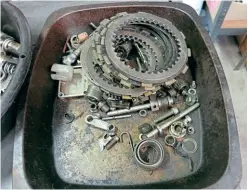  ??  ?? Clutch parts all over the place. In the end I found new springs and good plates, just had to buy a few single ones to complete the clutch basket.