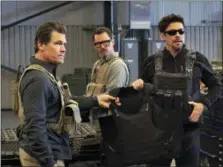  ?? RICHARD FOREMAN, JR. — SONY PICTURES VIA AP ?? This image released by Sony Pictures shows Josh Brolin, from left, Jeffrey Donovan and Benicio Del Toro in “Sicario: Day of the Soldado.”