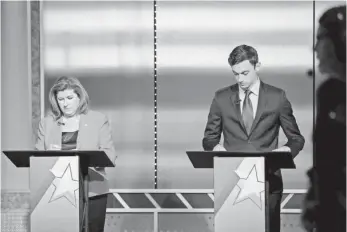  ?? BRANDEN CAMP, AP ?? Republican Karen Handel, left, and Democrat Jon Ossoff, candidates in Georgia’s 6th Congressio­nal District race, prepare to debate June 6 for the special election. Handel won the election.